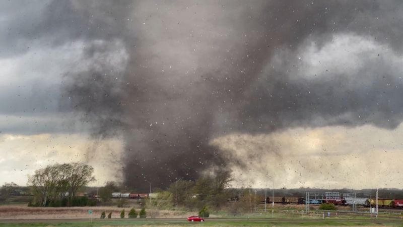 Devastating tornadoes rip through Nebraska and Iowa, sending crews searching flattened homes as storm threat continues