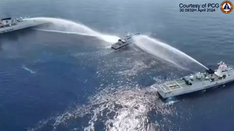 A screengrab taken from video provided by the Philippine Coast Guard shows China’s coast guard using water cannons against Philippine vessels near the Scarborough Shoal, in a disputed area of the South China Sea, according to the Philippine Coast Guard (PCG) on Tuesday, April 30.