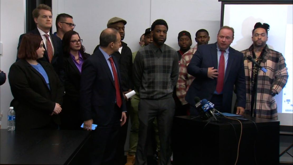 D. Todd Mathews, the lead counsel at the law firm Bailey & Glasser LLP, right, speaks during a press conference with attorneys and abuse survivors on May 7 in Chicago.