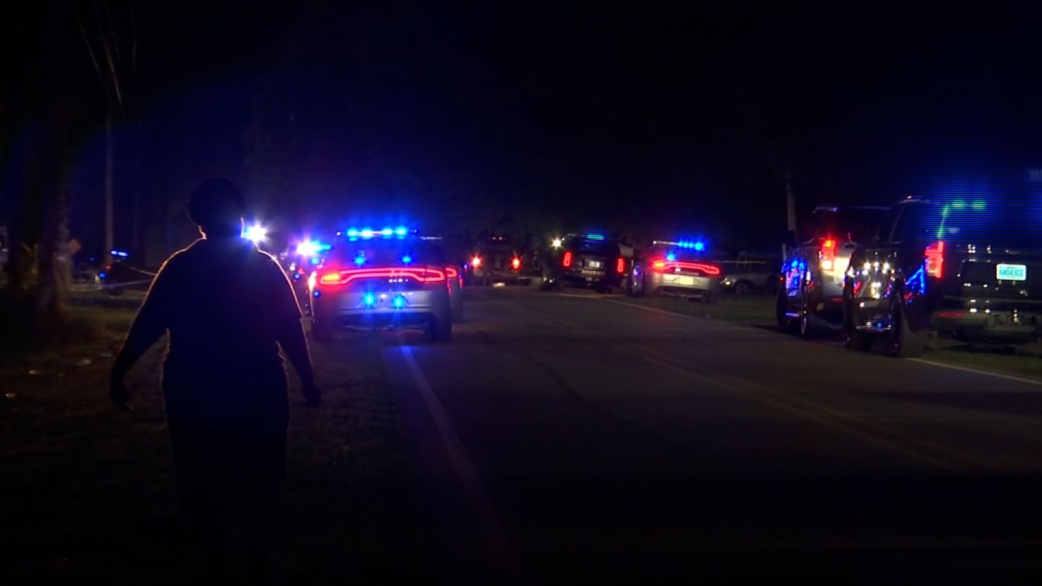 Police work the scene of a shooting in Stockton, Alabama, on May 11.