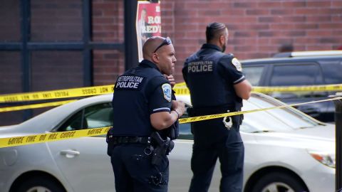 Police investigate the shooting of an officer in Washington, DC.