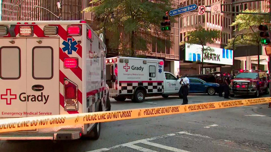 Ambulances arrive near the scene of the reported shooting.