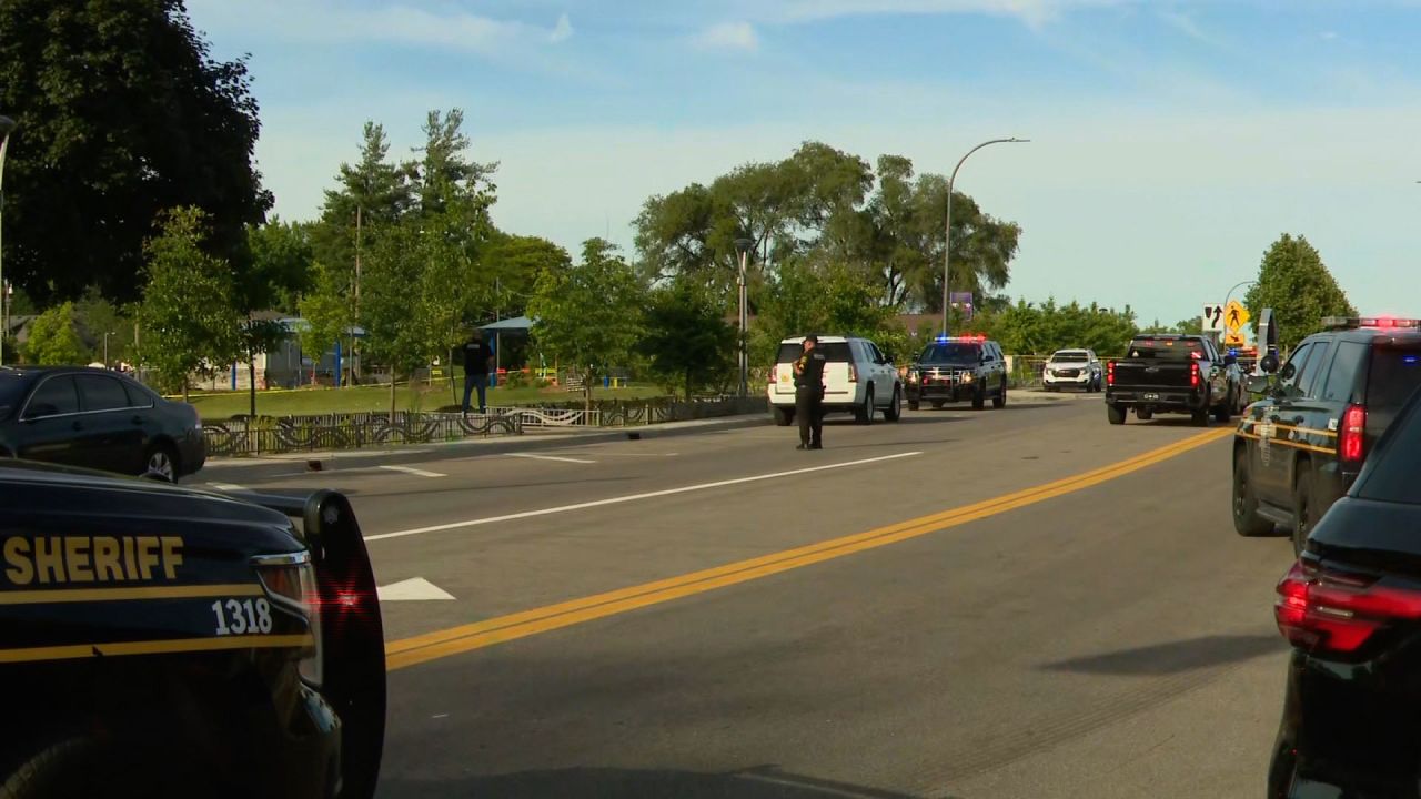 Police respond to the scene of a shooting at the Brooklands Plaza Splash Pad in Rochester Hills, Michigan, on Saturday, June 15, 2024.