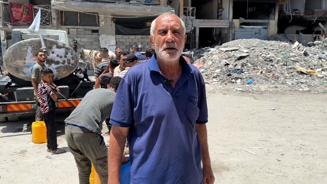 Hassan Kalash, pictured on June 12 in Jabalya refugee camp, in northern Gaza, says civilians are relying on thin water aid, as rights agencies warn of severe dehydration in the besieged territory.