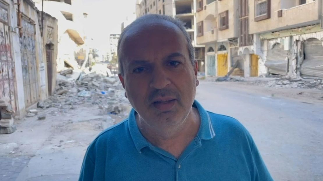 Tareq Ghanem, shown in Tal al-Hawa, in northern Gaza on July 12, told CNN that Palestinians are “dying in the streets,” as Israeli forces pull back from the area.