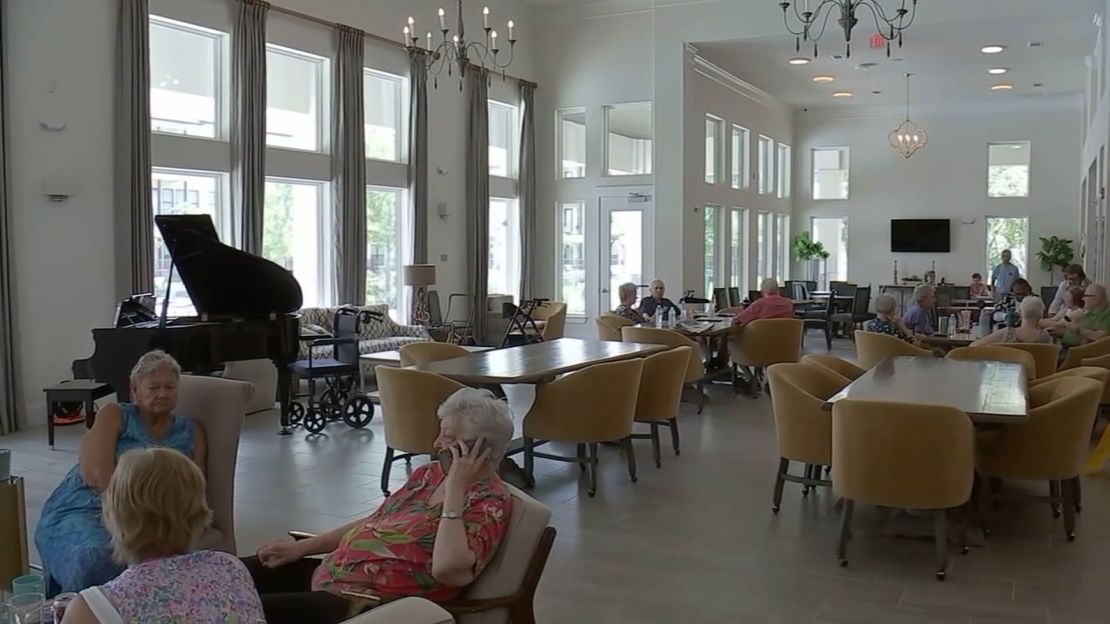 Residents in the generator-powered lounge of an independent living facility in the Kingwood community in Texas. The space became a lifeline for many older residents during the long power outage.