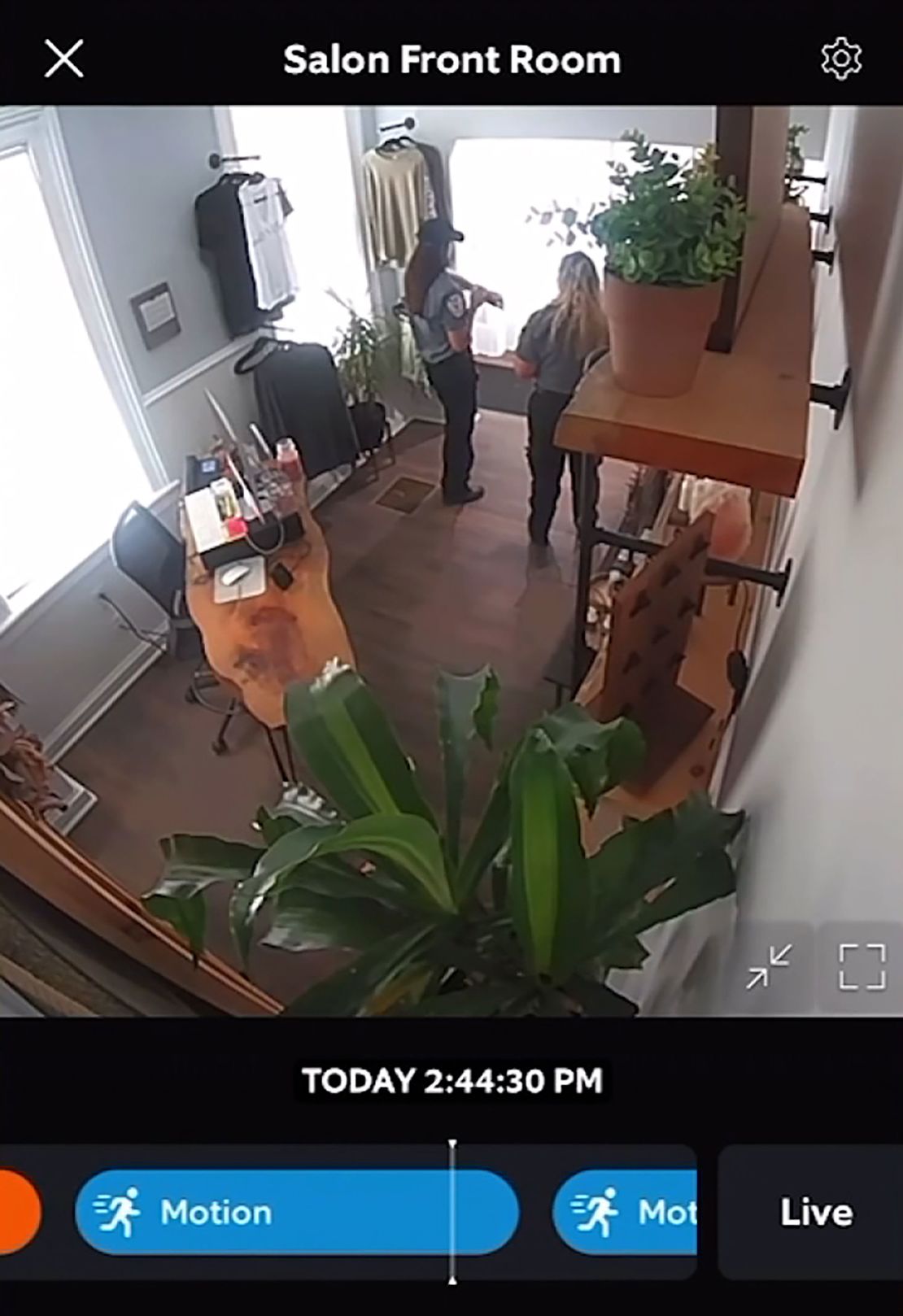 Surveillance video shows law enforcement officers inside the Four One Three Salon during a campaign event held by Vice President Kamala Harris in a venue next door.