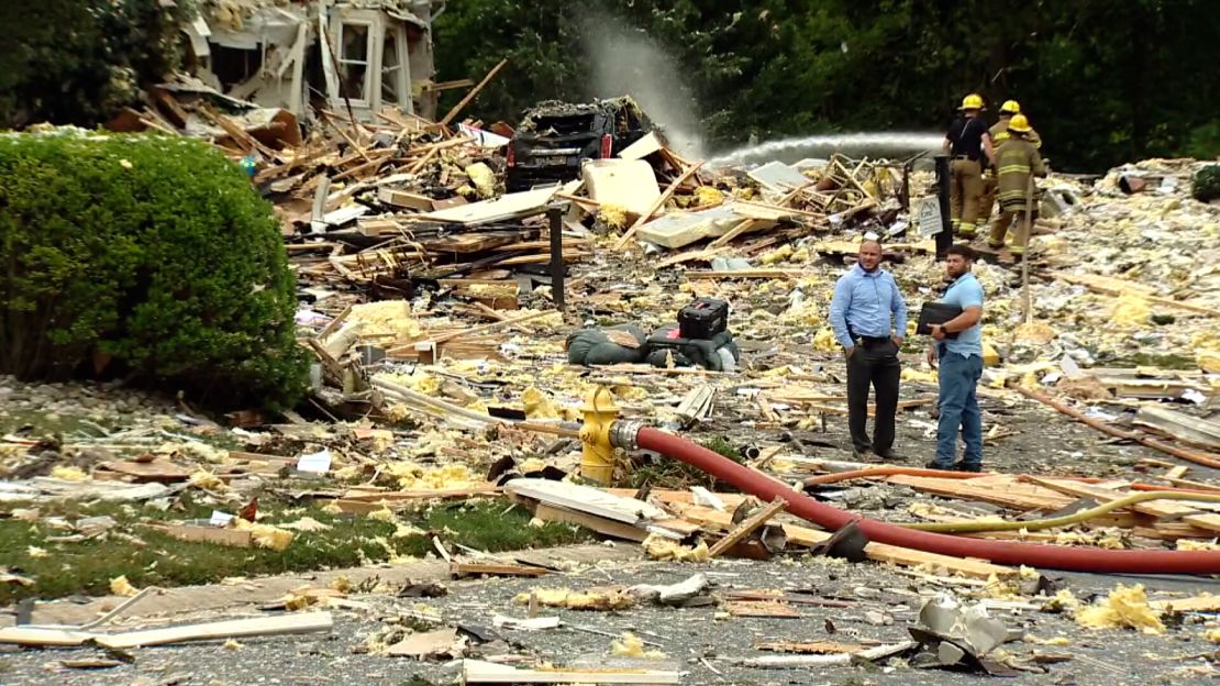 Emergency response officials respond to the scene of a house explosion in Harford County, Maryland, on Sunday.