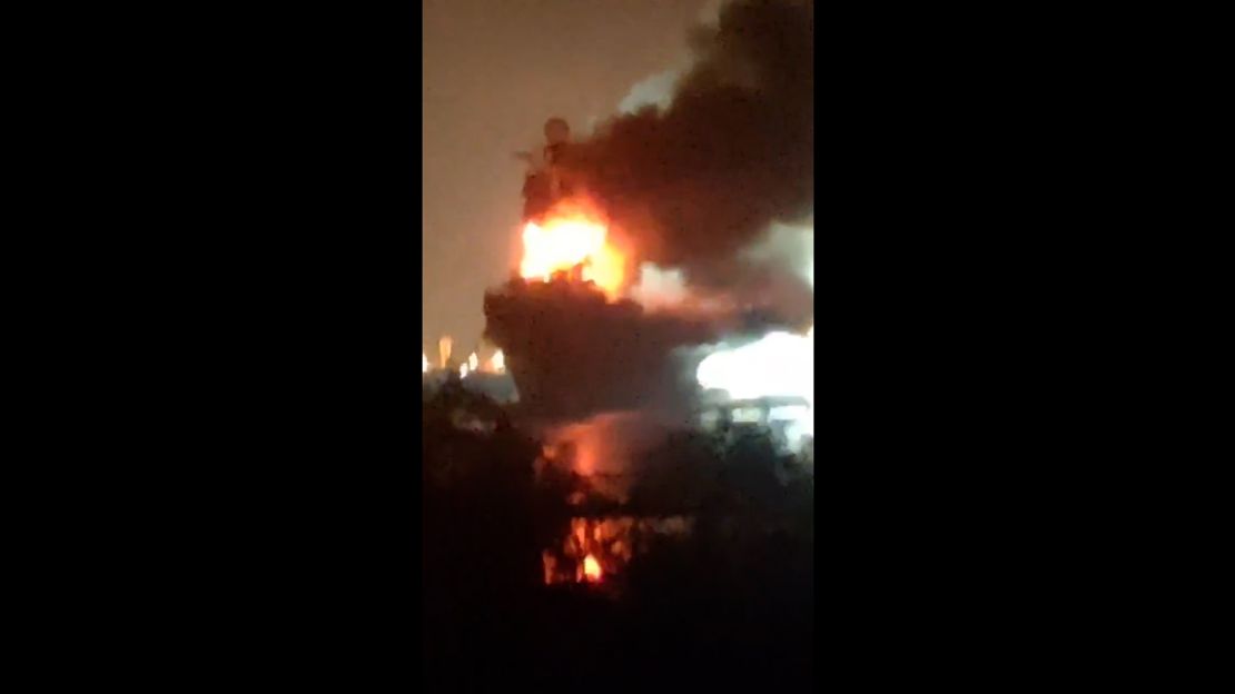 The former Soviet aircraft carrier Minsk burns in a lagoon in China over the weekend.