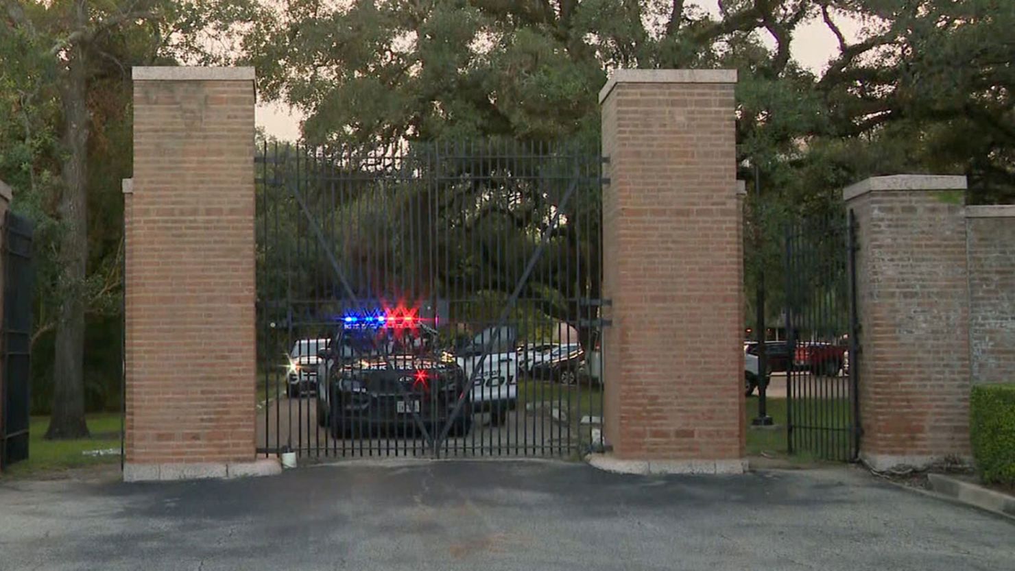 Police vehicles are seen on Rice University campus Monday after a reported homicide.