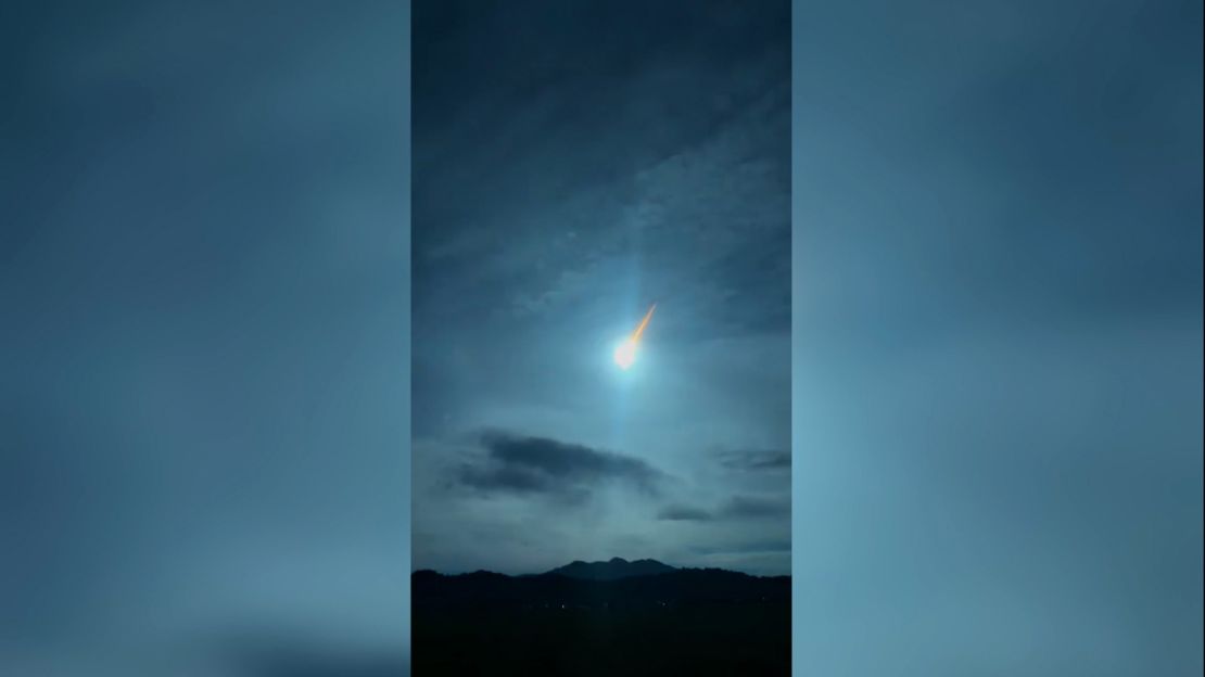 This screen grab taken from a video shows an asteroid burning up in the night sky as witnessed from Gonzaga in Cagayan province, Philippines, on September 4.