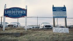 Signs seen outside the plant before its closure.