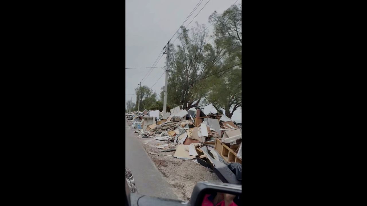 A still from video captured by resident Jose Erbella shows debris lining the streets in Anna Maria Island, Florida.