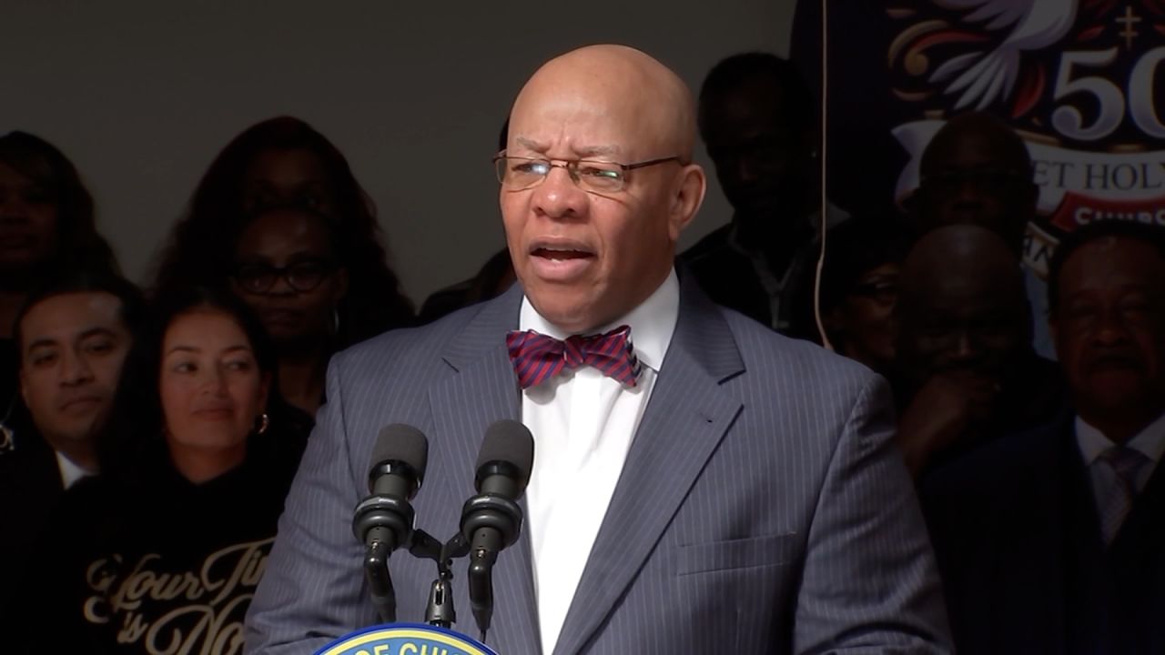 The president of the Chicago Board of Education, the Rev. Mitchell Johnson, speaks during a news conference on October 7 in Chicago.