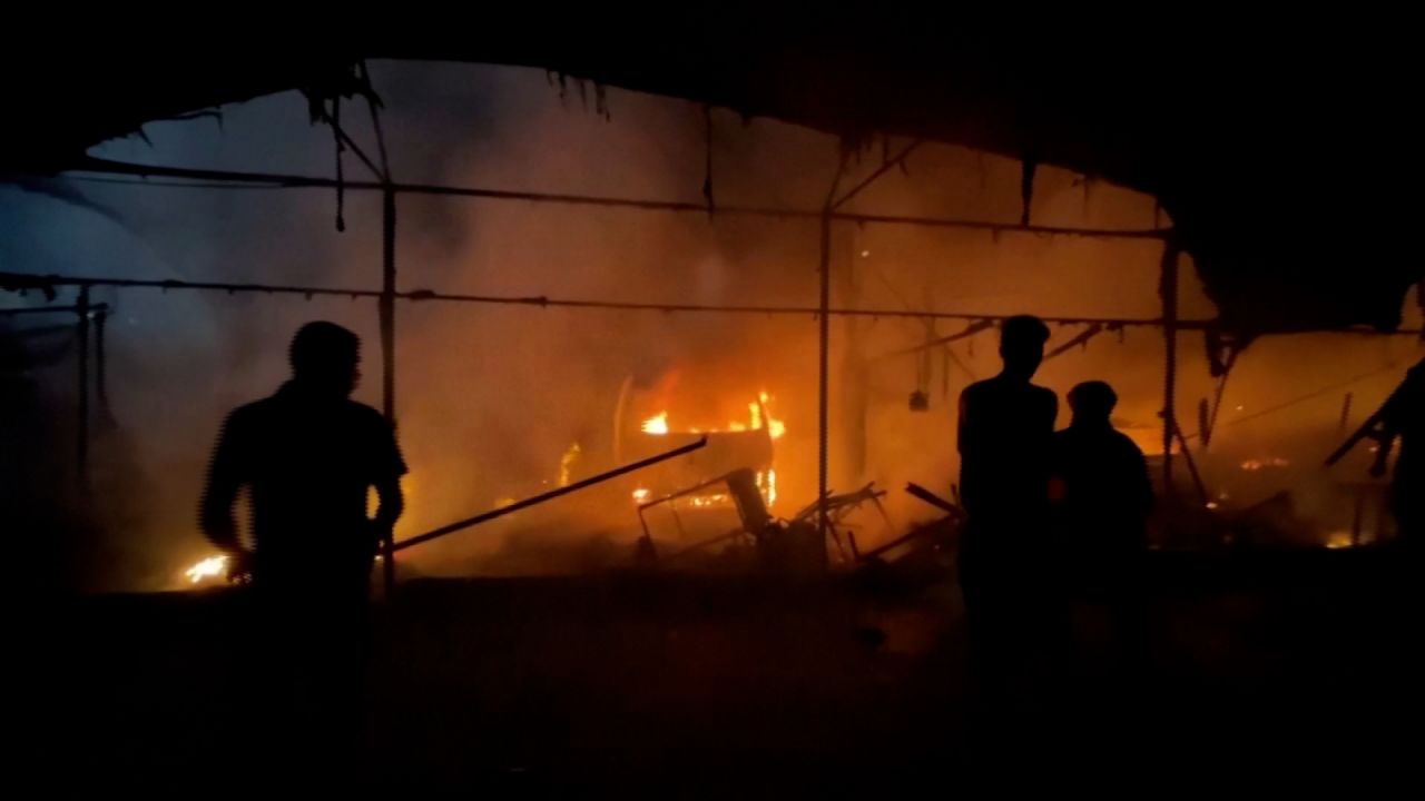 A screen grab from a video shows the aftermath of an Israeli airstrike in central Gaza on October 14.