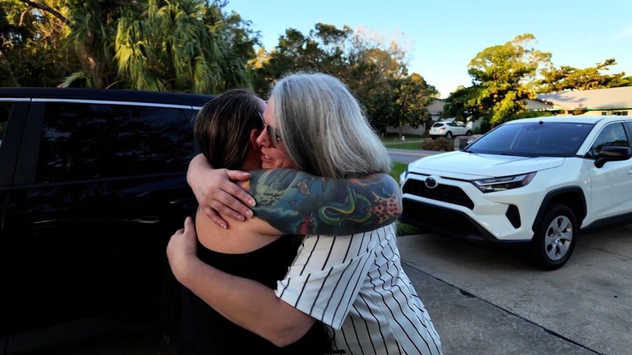 Michelle Westfield and Brandi Clarke embrace. 