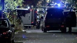 Police work the scene of a standoff following a shooting in Minneapolis, Minnesota, on October 28, 2024.