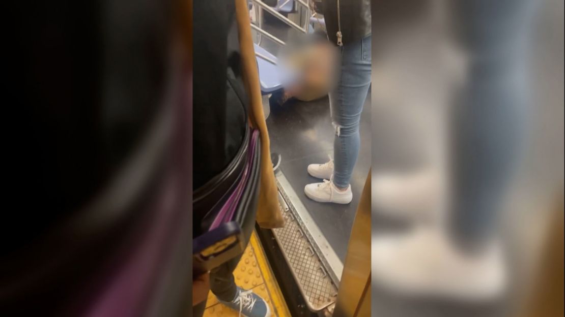 A still from a video shown to jurors in court shows Daniel Penny gripping a man around the neck on a New York subway train. Parts of the image were blurred by CNN.