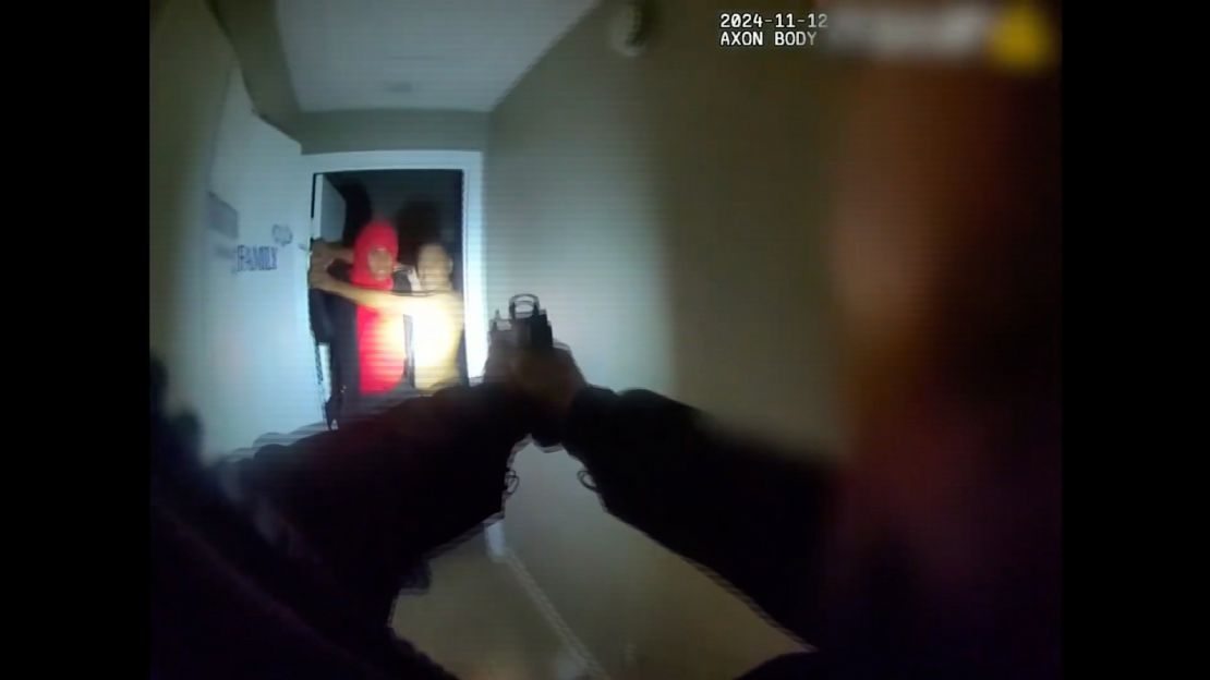 Video from Officer Alexander Bookman's body camera shows Brandon Durham, right, and Alejandra Boudreaux, left, in a struggle over a knife. Police say Bookman shot Durham multiple times after ordering them to drop the knife.