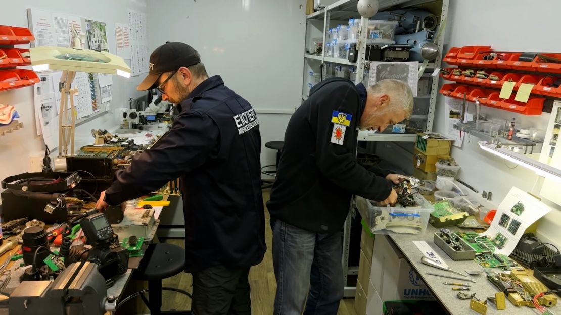 Investigators at Kyiv’s Scientific Research Institute of Forensic Expertise examine the debris of KN-23 missiles that Russia has used to attack Ukraine.