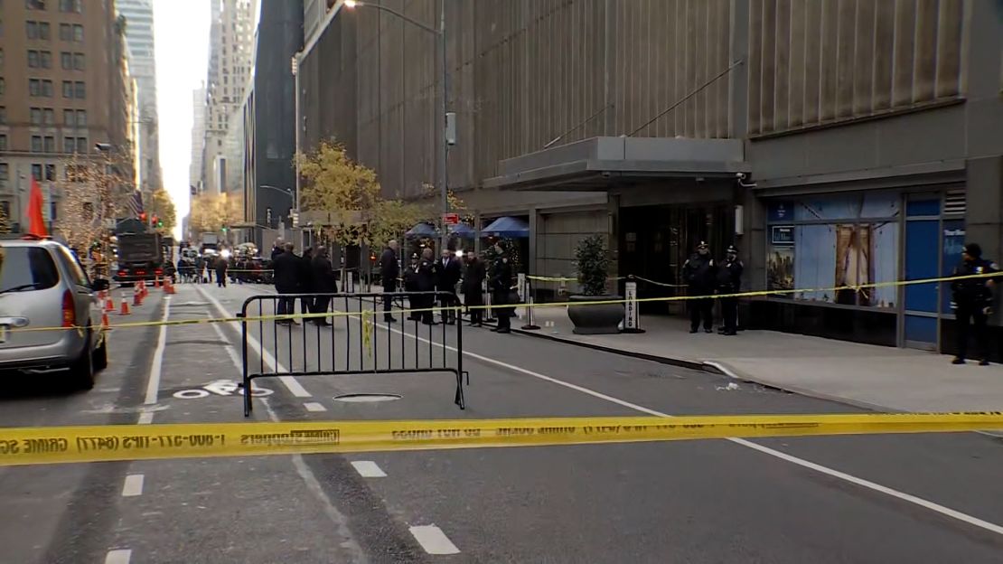 Police work on December 4 work the scene where UnitedHealthcare CEO Brian Thompson was shot in New York.