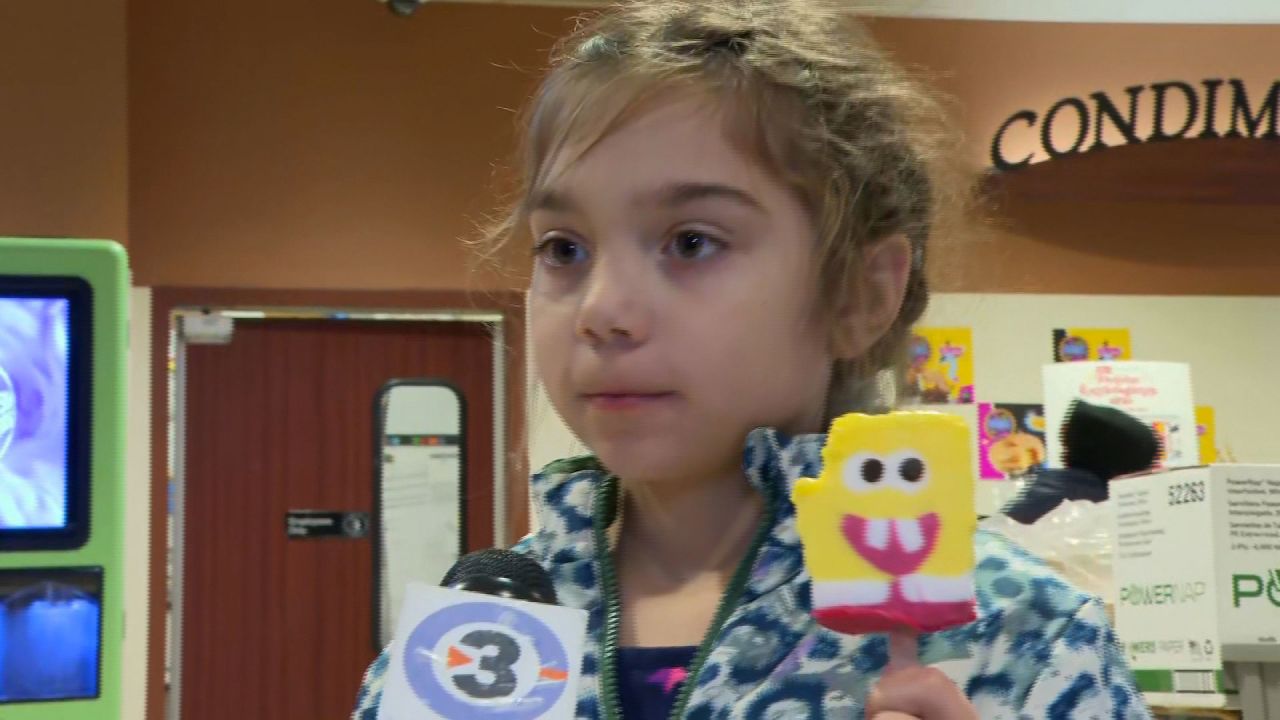 Second-grade student Nora Gottsckalk speaks to CNN affiliate WISC in Madison, Wisconsin, on December 16.