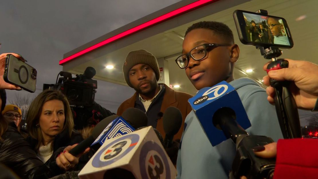 Sixth-grader Adler Jean-Charles speaks to reporters in Madison, Wisconsin, on Monday.