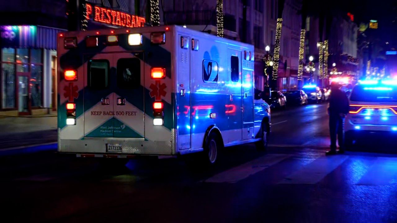 An ambulance arrives at the scene in New Orleans on Wednesday.