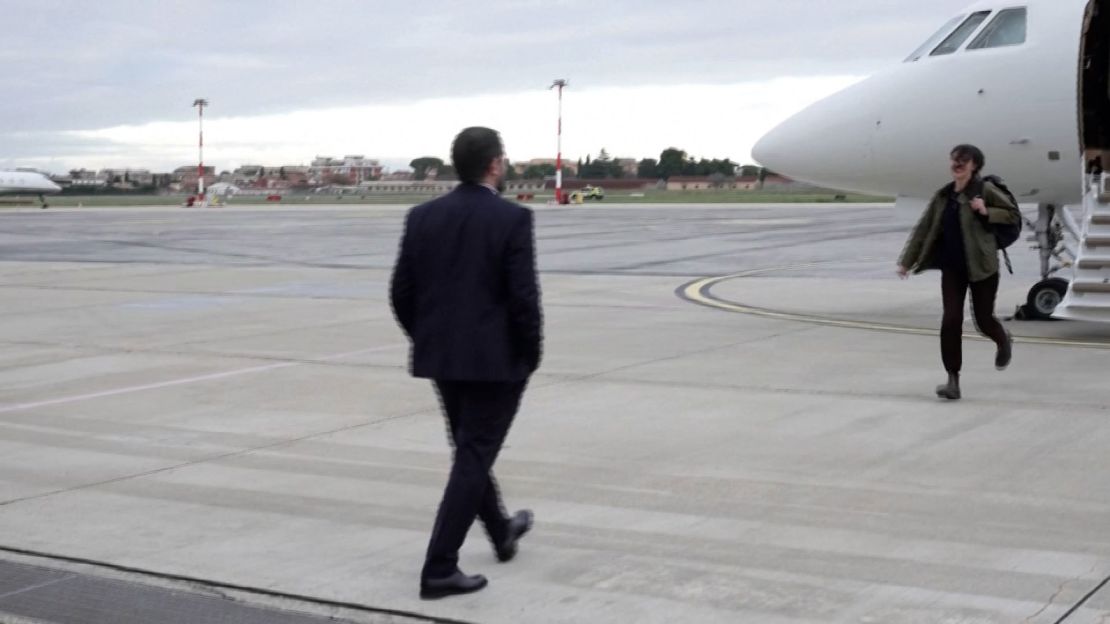 This screengrab taken from a video shows the journalist after landing in the Italian capital on Wednesday.