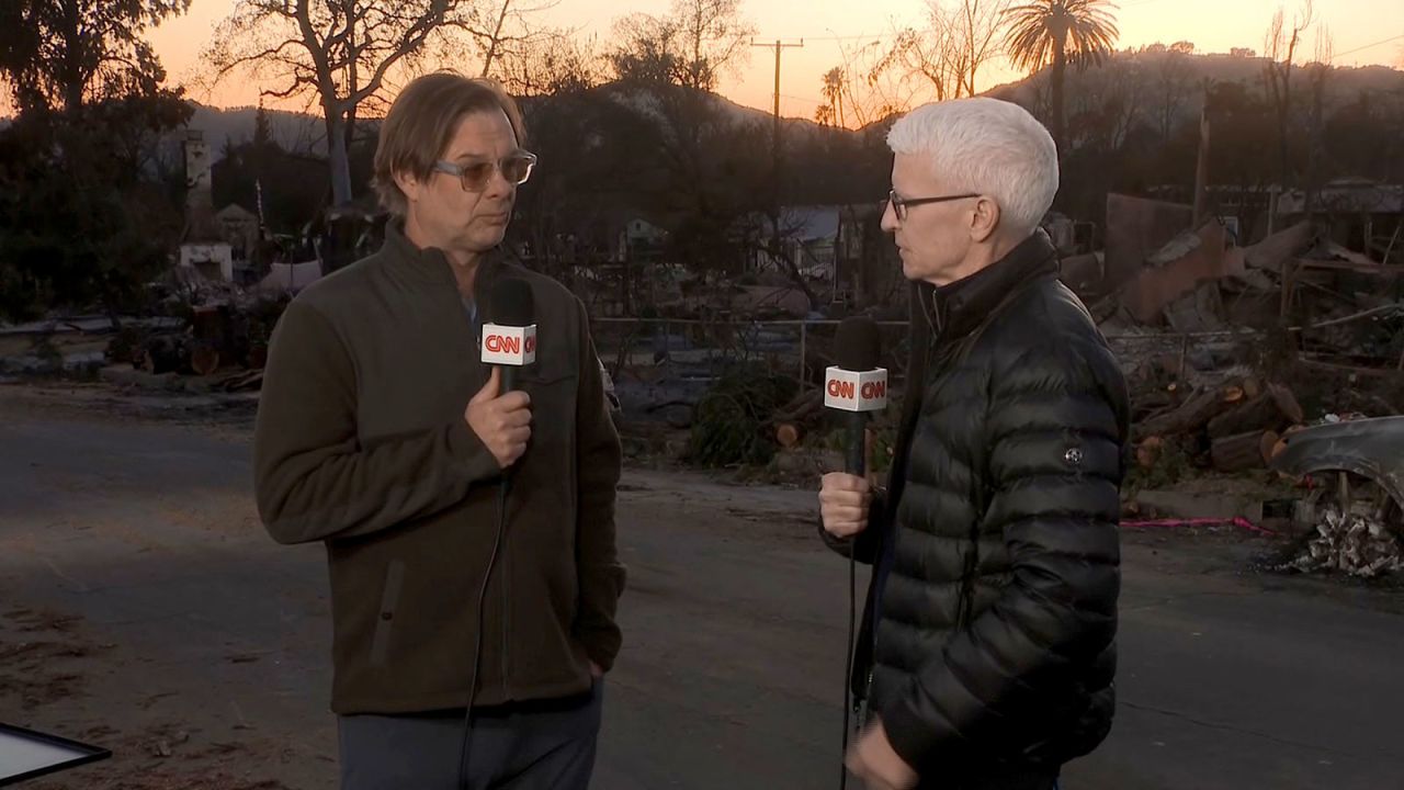 Photojournalist Kevin Cooley speaks with CNN's Anderson Cooper on Tuesday.