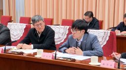 This screengrab shows Chinese hedge fund manager Liang Wenfeng, who founded DeepSeek, in a symposium with Chinese Premier Li Qiang in Beijing on January 20, 2025.