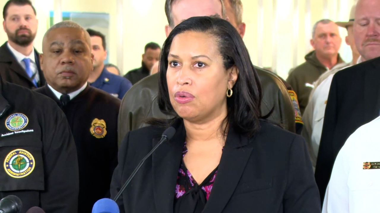 Mayor Muriel Bowser speaks during a press conference at Reagan National Airport on Thursday.