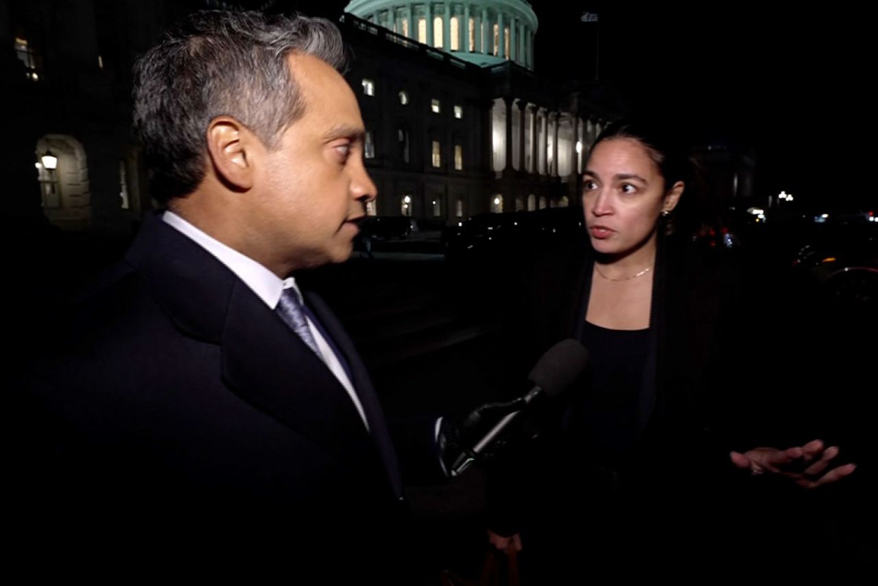 Rep. Alexandra Ocasio-Cortez speaks with CNN's Manu Raju on Monday.