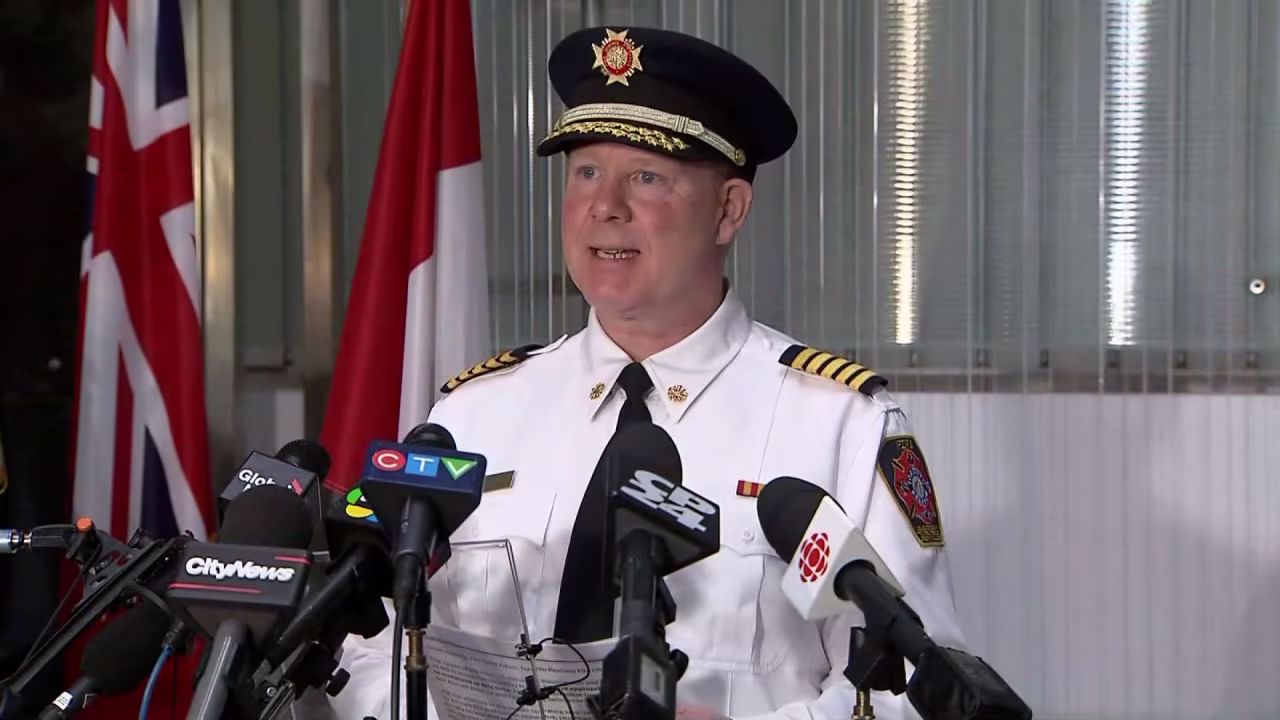 Toronto Airport Fire Chief Todd Aitken speaks at a news conference in Toronto on Monday.