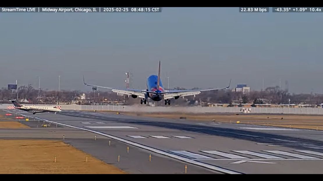 In this screengrab made from video, a Southwest Airlines plane and a private jet are seen in a near miss incident at Chicago's Midway International Airport, on February 25.