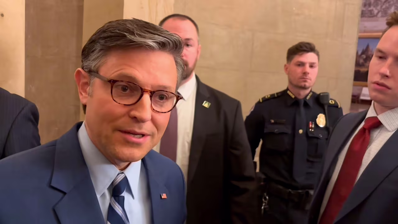 Speaker Mike Johnson speaks with reporters on Monday.