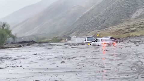 Cars are seen trapped in a mudslide in San Jacinto, California, on Thursday.