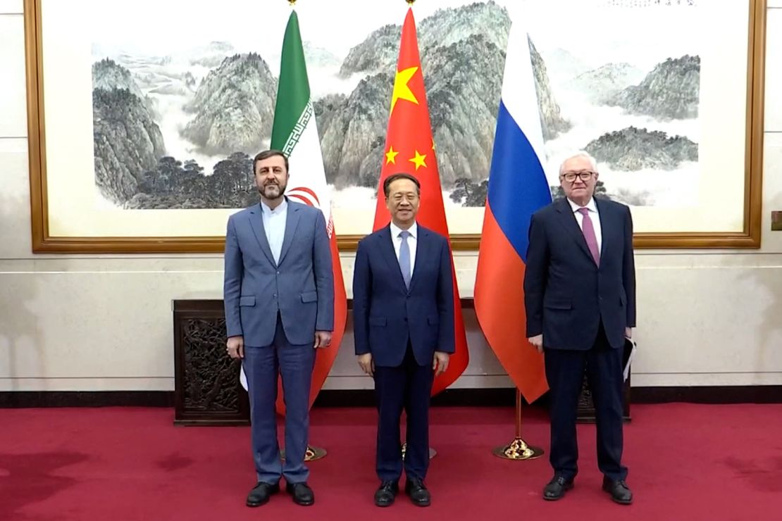 China's Executive Vice Foreign Minister Ma Zhaoxu (center) hosts Iranian Deputy Foreign Minister Kazem Gharibabadi (left) and Russian Deputy Foreign Minister Sergei Ryabkov in Beijing on Friday.