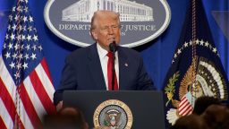 President Donald Trump speaks at the Department of Justice on Friday.