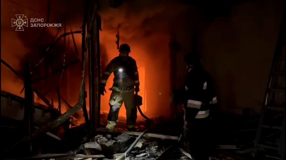 A frame from a video shared by the State Emergency Service of Ukraine shows fire fighters battling a blaze in the Zaporizhzhia region of Ukraine, on Thursday, March 20.