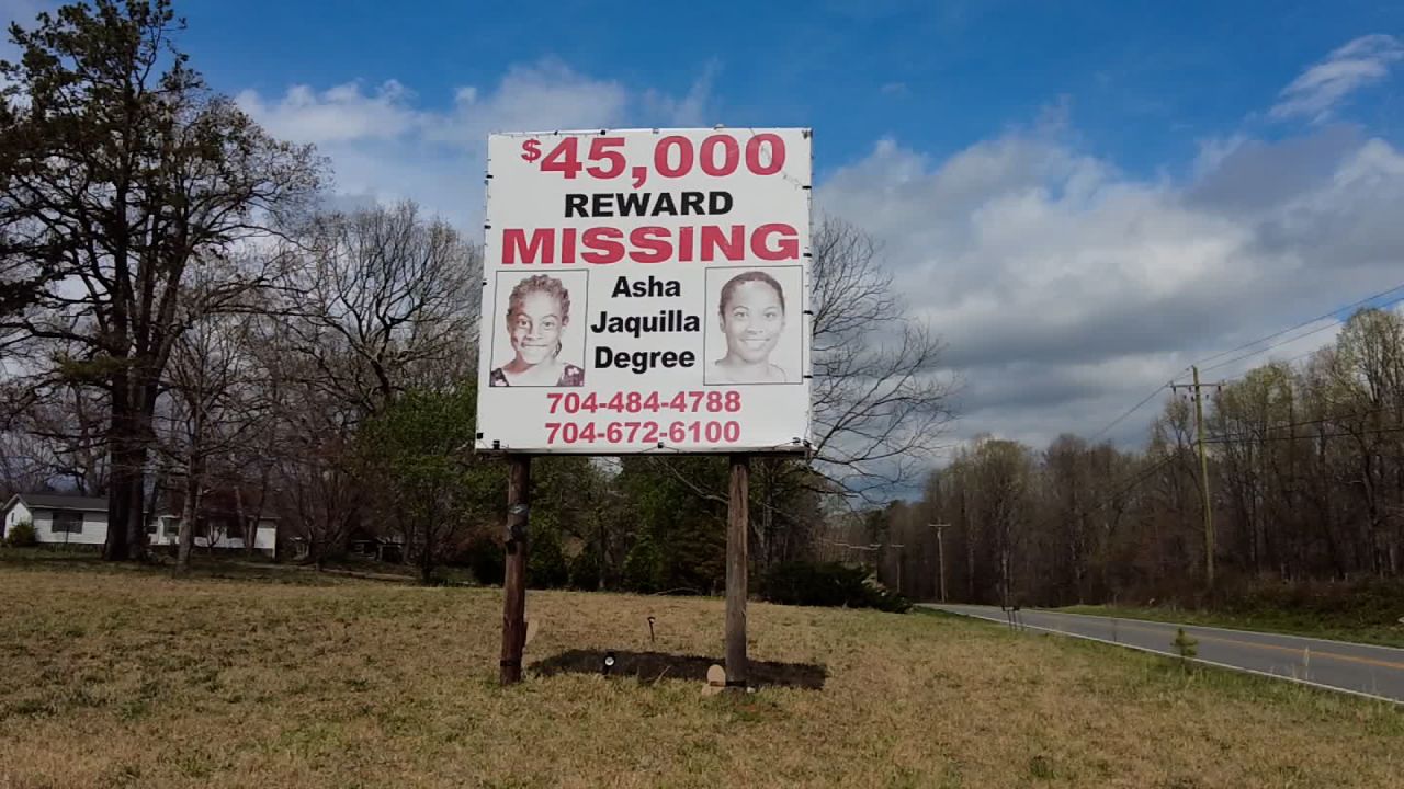 A missing poster for Asha Degree is seen.