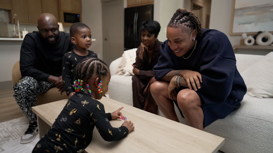 CNN's Larry Madowo shares a moment of joy with Rotimi, Vanessa Mdee, and their kids, Seven (left) and Imani (right).
