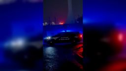 Police respond to reports of cars being swept away or stuck in floodwaters in Moore, Oklahoma, on April 20, 2025. 