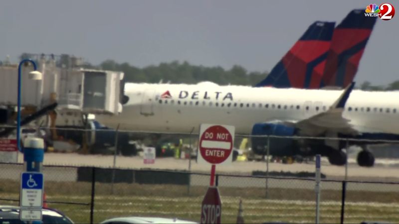 Chaos on the Tarmac Delta Passengers Flee Plane as Engine Erupts in Flames
