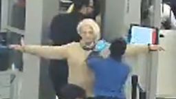 In this still from Port Authority of New York and New Jersey video obtained by CNN, Svetlana Dali gets patted down after going through a security checkpoint.