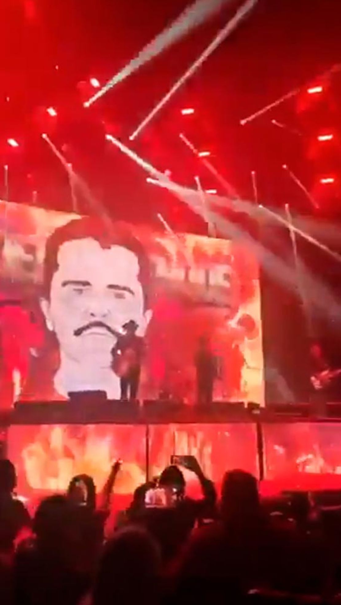 This still from video posted by the US Deputy Secretary of State Christopher Landau shows the Mexican band Los Alegres del Barranco performing in front of a cartoon of Mexican drug lord El Mencho.