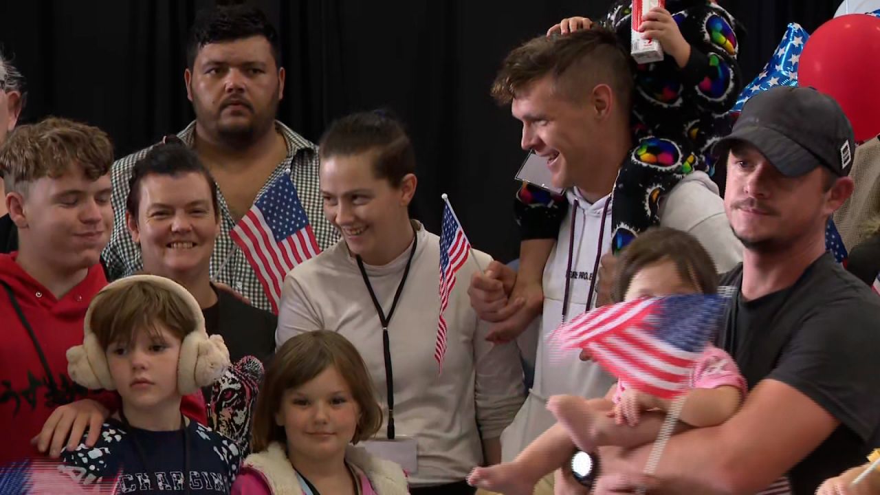 White South Africans granted refugee status in the United States by the Trump administration arrive at Washington Dulles airport in Virginia on Monday.