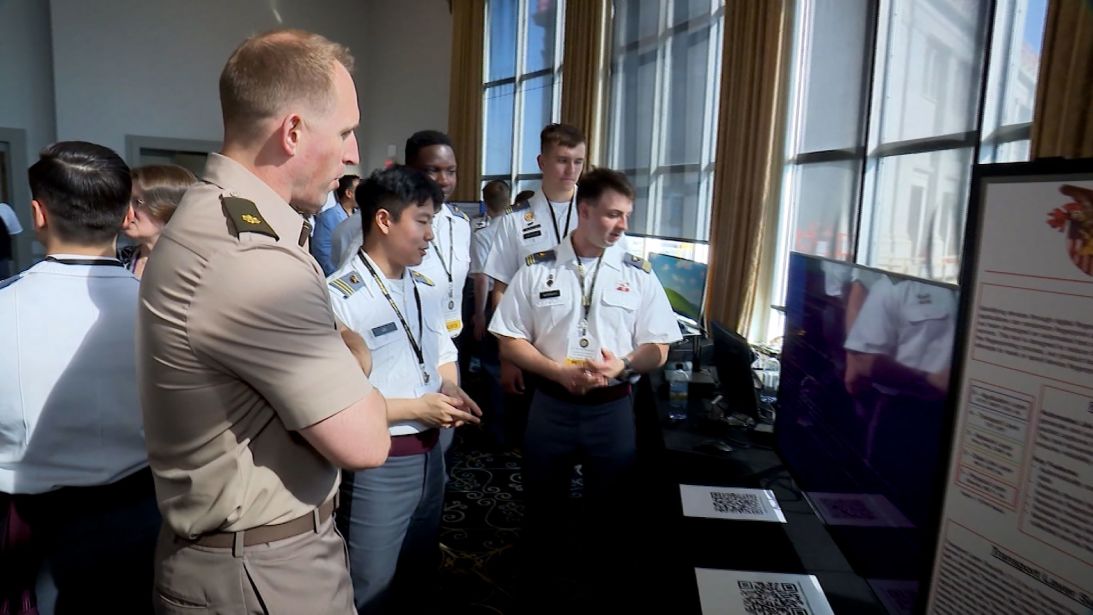 Cadets explain their projects at the annual research symposium at West Point.