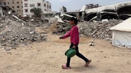 Tareq Al Hilou in Gaza (with Abeer Salman in Jerusalem) managed to follow one family on a quest to find something to drink and eat. Tareq spent a day with a young girl who sources drinking water for her family, including a baby sister, by carrying heavy buckets of water into their half destroyed home. When he came back to film more a few days later, he found out the baby has died of malnutrition.