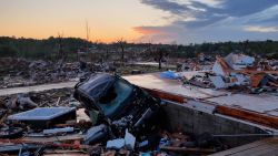 Leveled homes, snapped trees and flipped cars are seen on Saturday, May 17 after a possible tornado swept through London, Kentucky, on Friday.